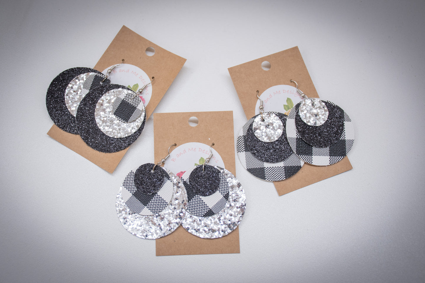 Faux Leather Earring Black Glitter, Silver Glitter & Black and White Buffalo Circle Design